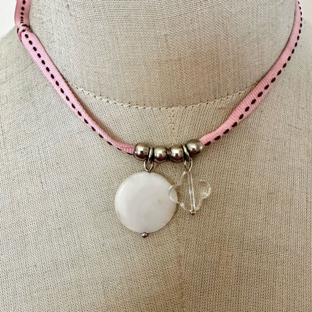 Marc Labat abalone pendant necklace on pink ribbon